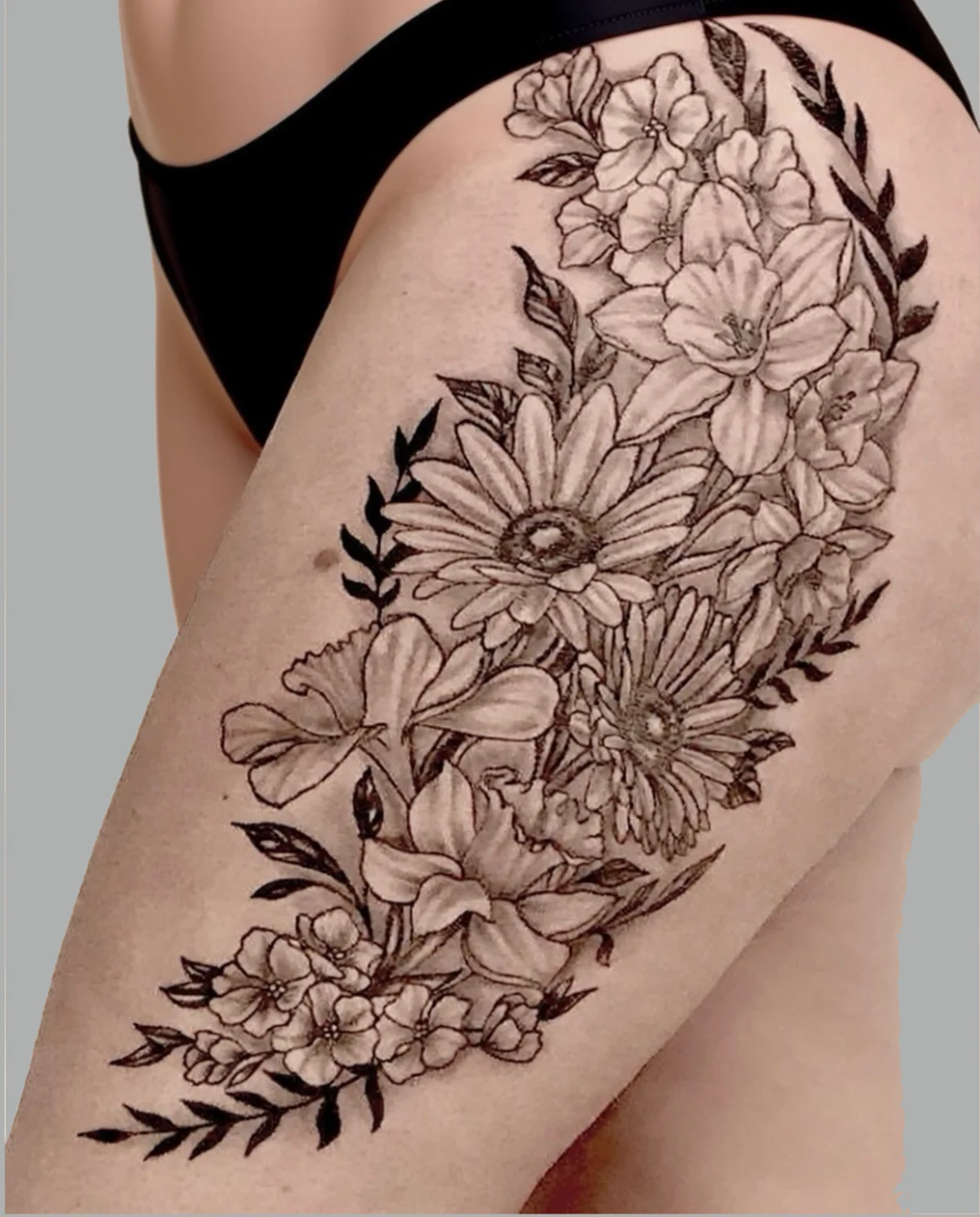 Black and grey tattoo by Trish at Lotus Tattoo