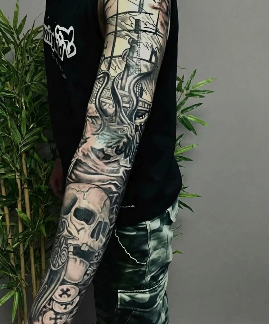 Black and grey tattoo by Trish at Lotus Tattoo